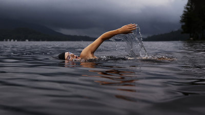 Man swimming in a lake