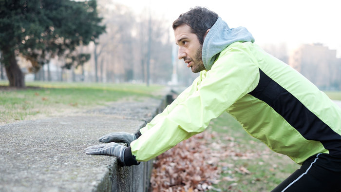 Runner stopping to stretch