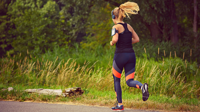 Woman running with headphones